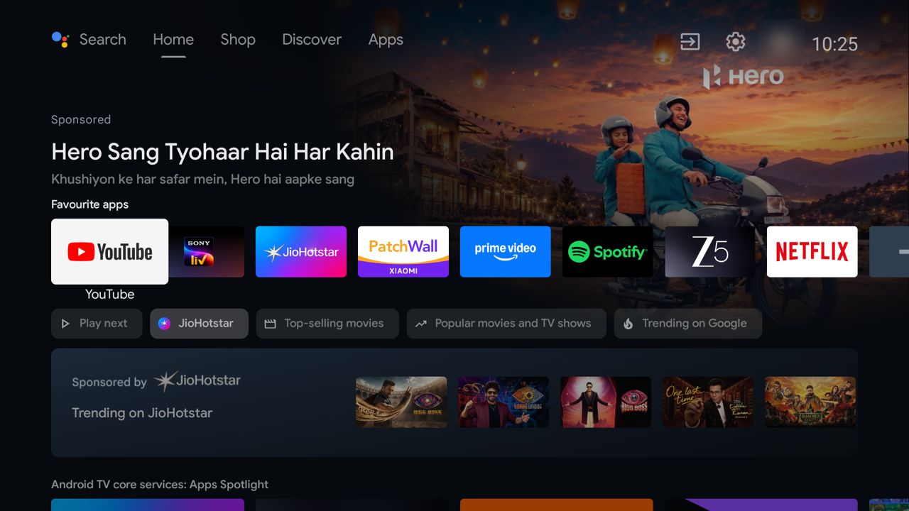 Before: the stock Google TV home with a sponsored Hero ad, a Sponsored by JioHotstar row and a PatchWall tile