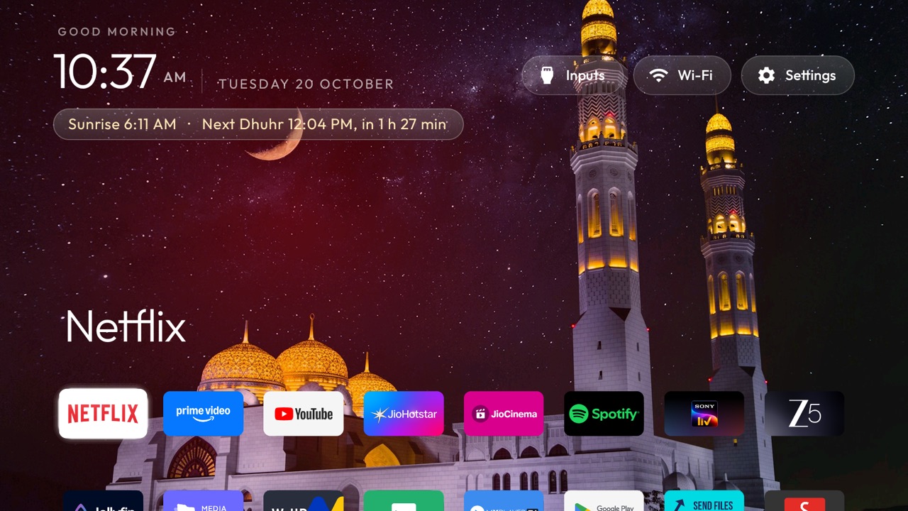 Home with a white mosque, gold domes and a crescent moon as the wallpaper