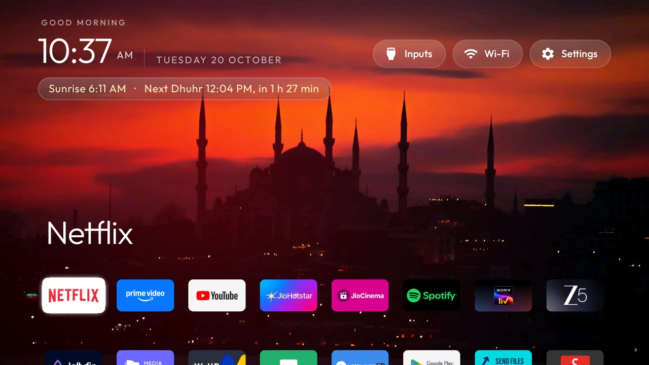 Home with minarets against a red sunset as the wallpaper
